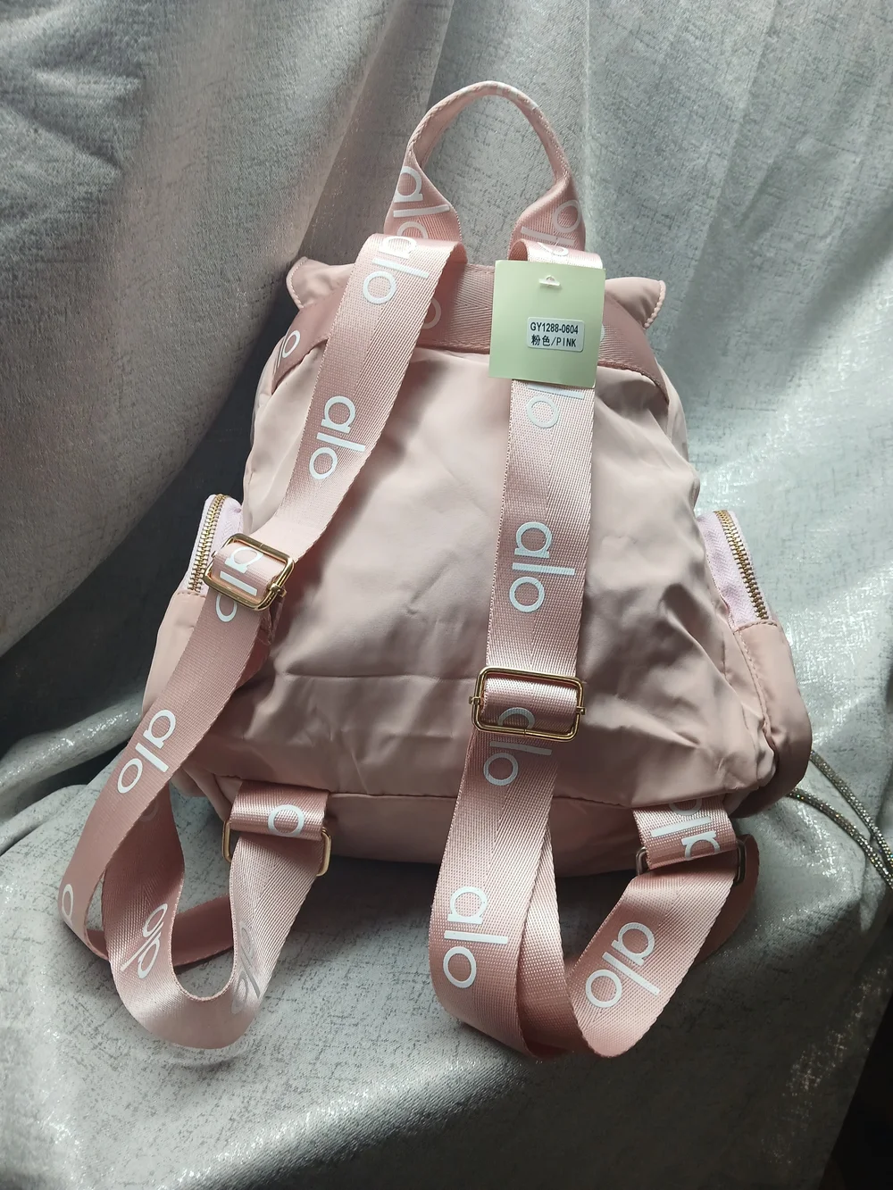 ALO Yoga Blush Pink Drawstring Backpack with Gold Hardware